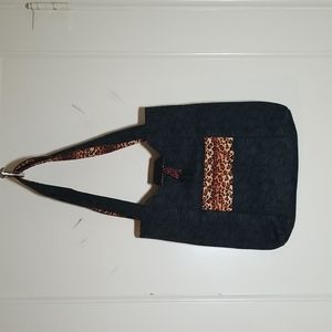 Purse / Bag / Tote made out of cloth with animal print